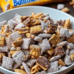 Butterfinger Puppy Chow – Crunchy, Sweet & Loaded with Peanut Butter Candy Flavor!