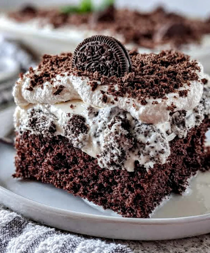 Oreo Poke Cake – Rich, Creamy & Loaded with Cookies and Cream Goodness!