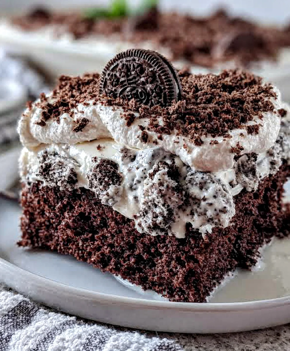 Oreo Poke Cake – Rich, Creamy & Loaded with Cookies and Cream Goodness!